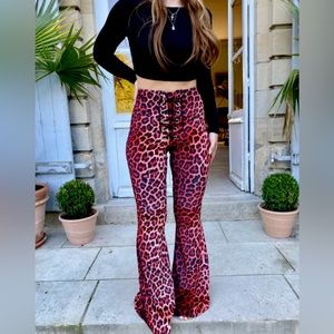 Flare leopard pants with tie in front.